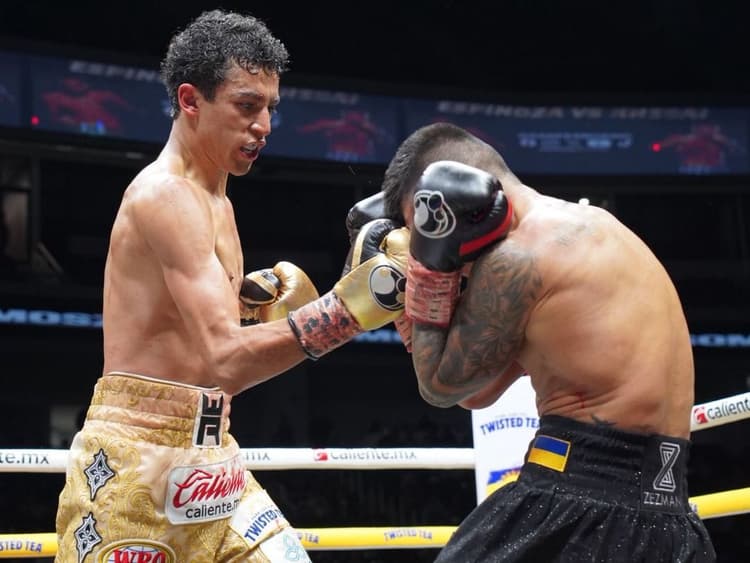 Rafael Espinoza Pummels Arnold Khegai In 11, Retains WBO Featherweight Title