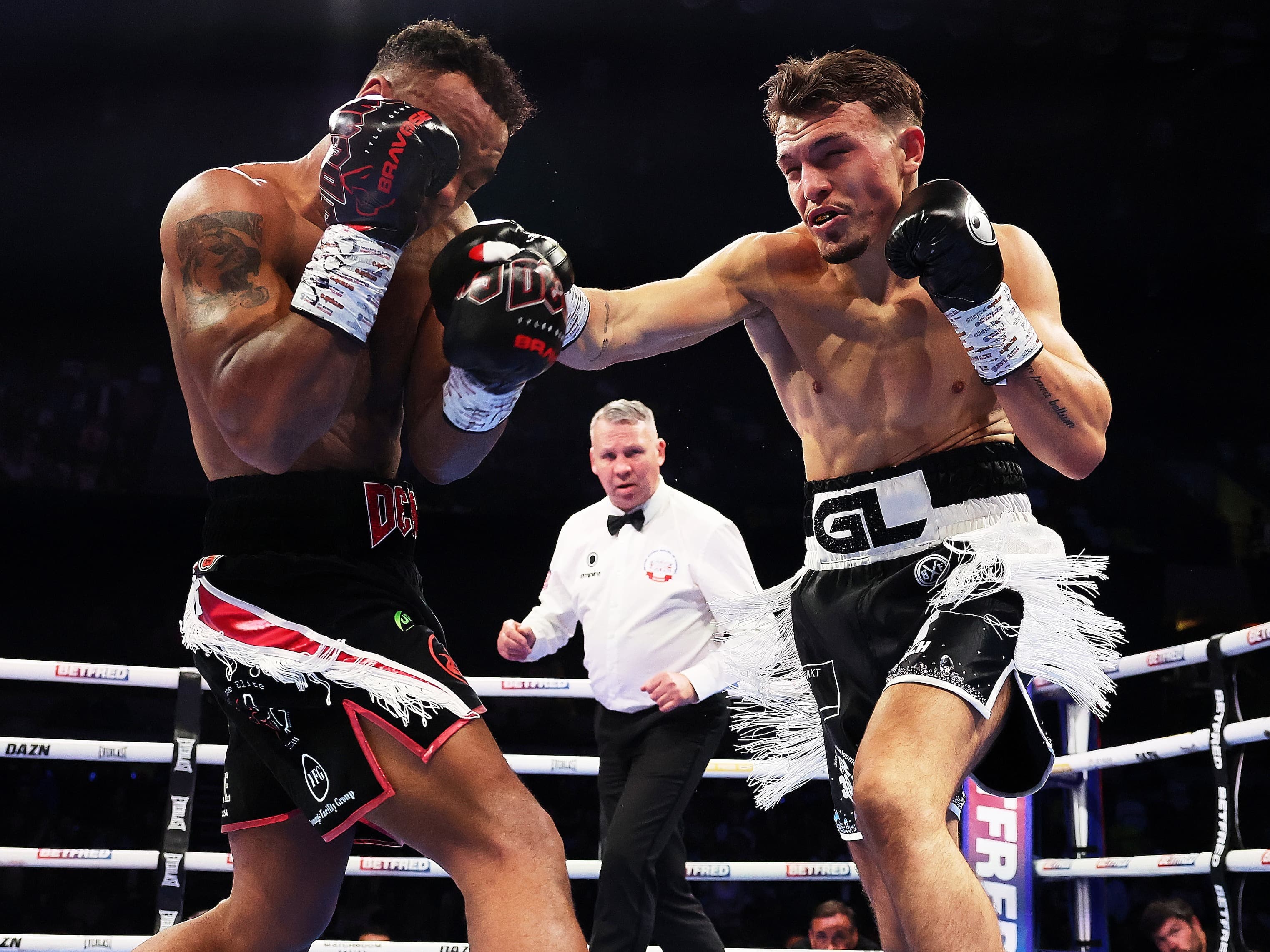 Liddard endures gutcheck, outpoints Denny in British title defense