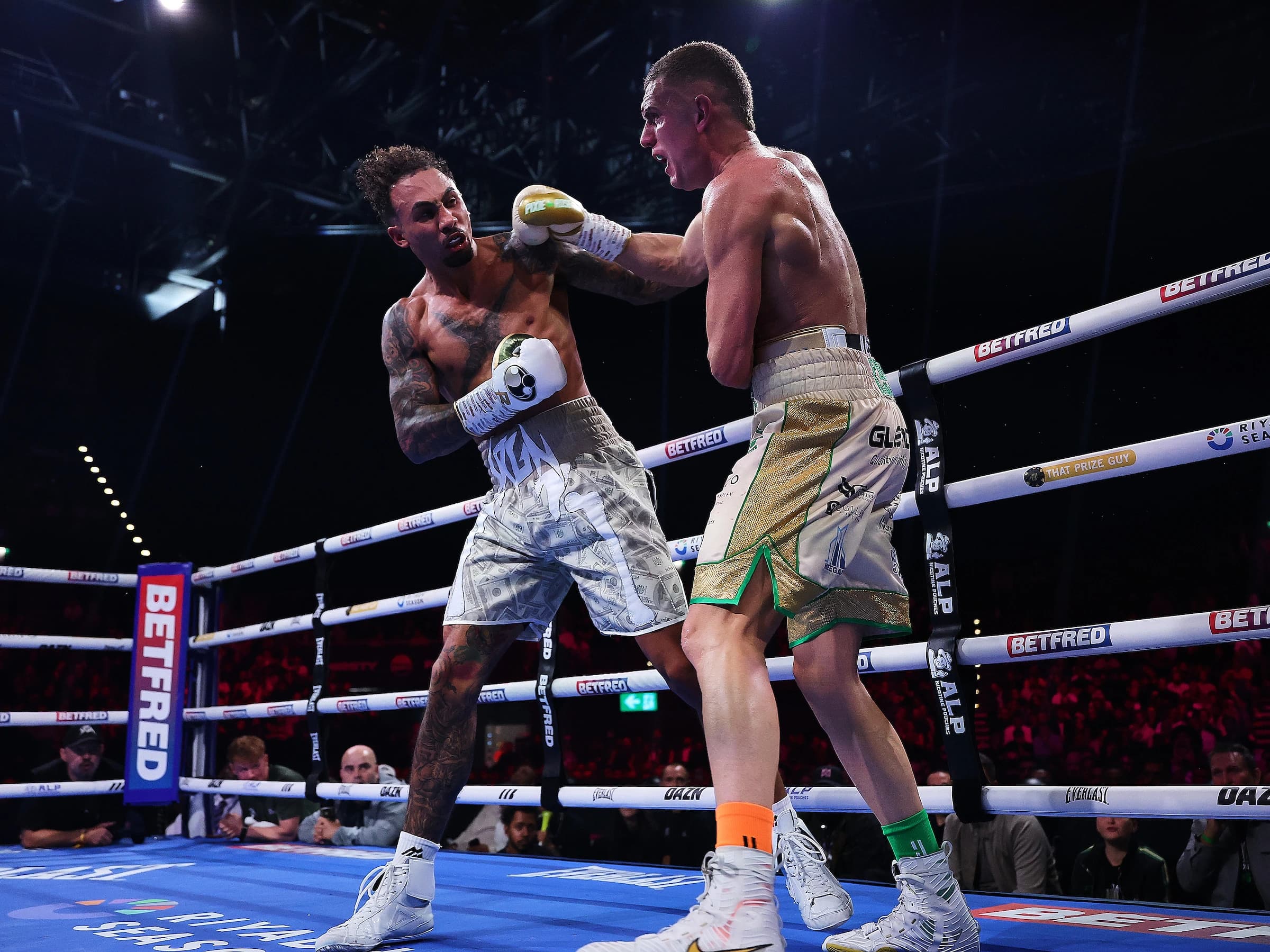Whittaker stifles Wallace rally, eyes showdown with Bivol