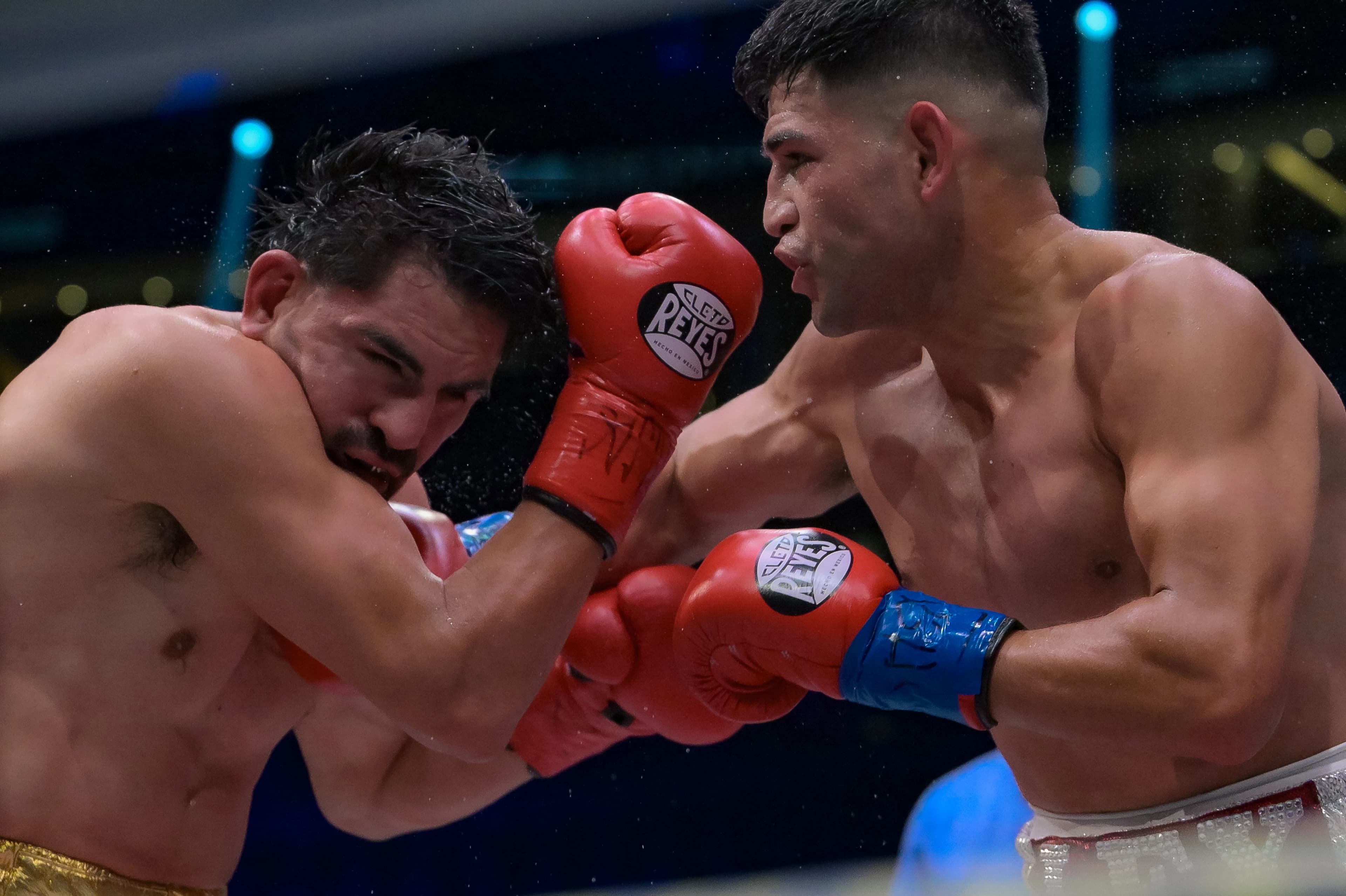 Bloodied Rocha Fends Off Ramirez, Wins Unanimous Decision